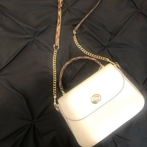 White coach purse. Gently worn. small ink stain inside